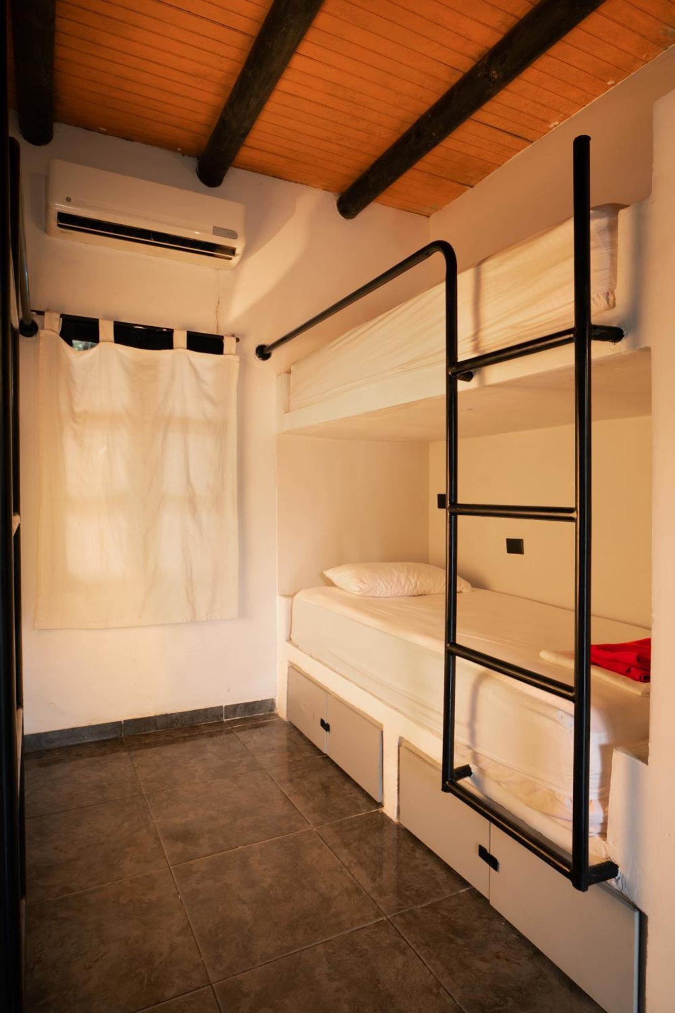 Bed in 8-Bed Mixed Dormitory Room with Air Conditioning